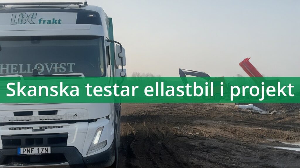 LBC Frakt ellastbil från Hellqvist Åkeri & Entreprenad. Bilen står och ska bli lastad. Mitt över går det en grön banner där det står: 