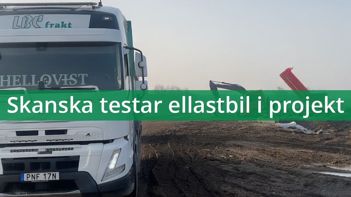 LBC Frakt ellastbil från Hellqvist Åkeri & Entreprenad. Bilen står och ska bli lastad. Mitt över går det en grön banner där det står: 